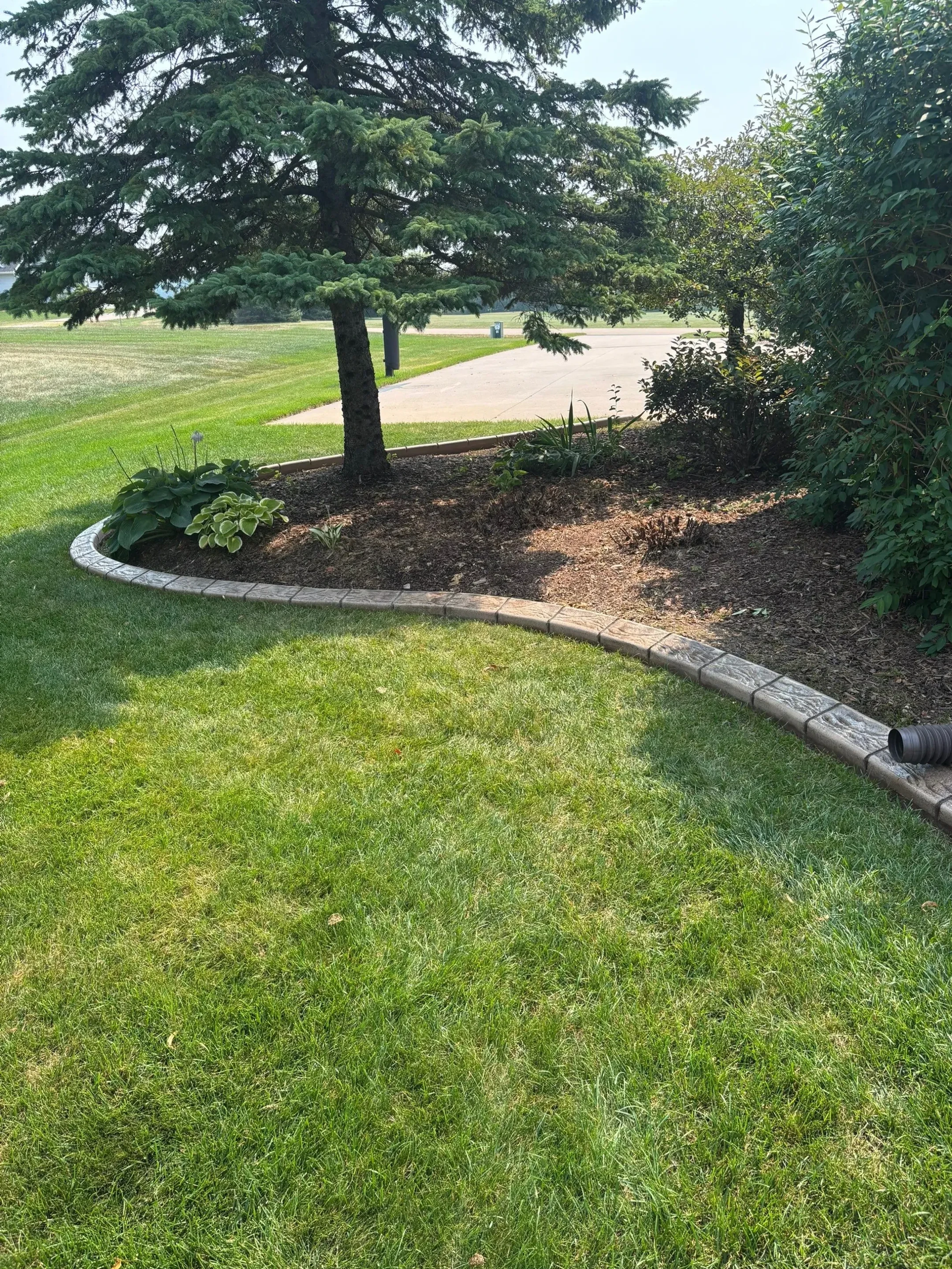 Landscape curbing equipment and installation
